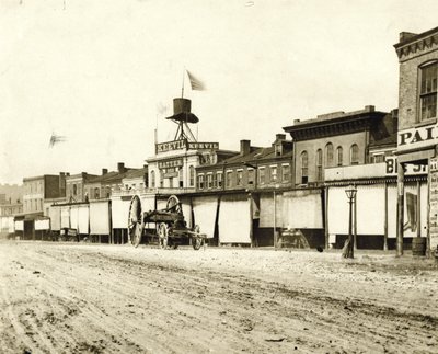 Commercial buildings along Broadway south of Carr Street. Keevil Hatter is pictured at 950 Broadway by Emil Boehl